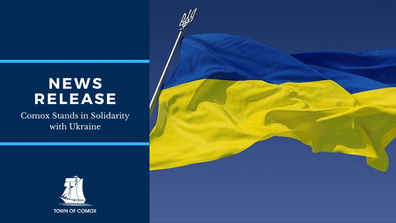 Blue and yellow Ukrainian flag against a blue sky