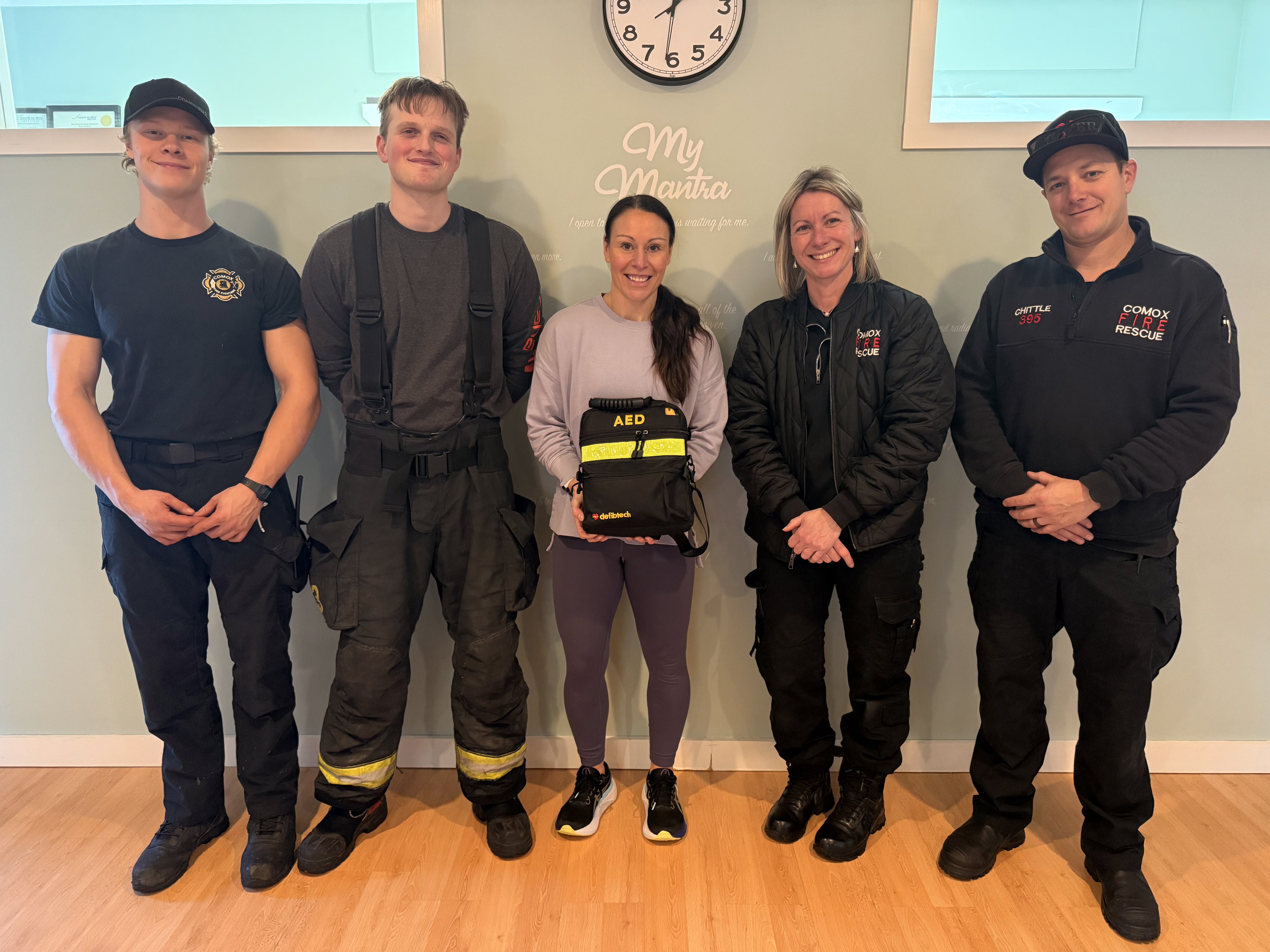 AED donation from Comox Firefighters Association to local business.