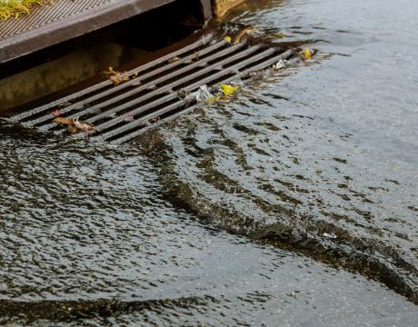 Water flowing down storm drain