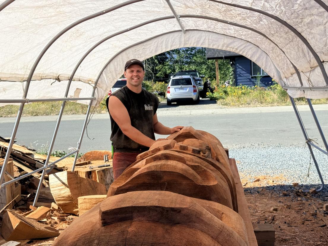 Karver Everson with the new Glacier Ave Totem Pole